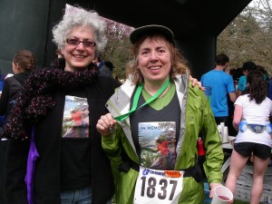 With my sister at the finish line - both wearing memory shirts for Tommy